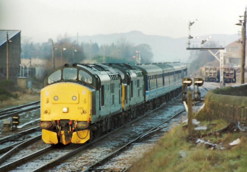 Photo of 37250 & 428 pass Larbert with the Southbound 'Highland enterprise'.