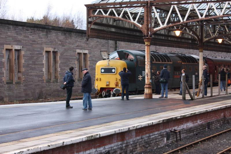 Photo of 55022 has her windscreens cleaned.