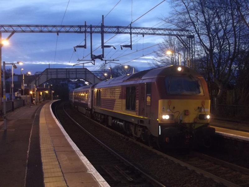 Photo of 67007 pauses at Westerton with the 1Y11 0450 Edinburgh-Fort William sleeper.  21st March 2012.