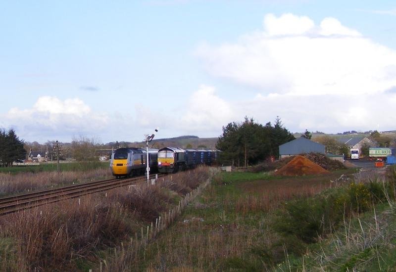 Photo of DRS 66 crosses with EC HST at Insch?!