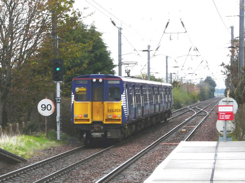 Photo of 314203 departs from Barassie while on a test run fro Ayr to Shields. 