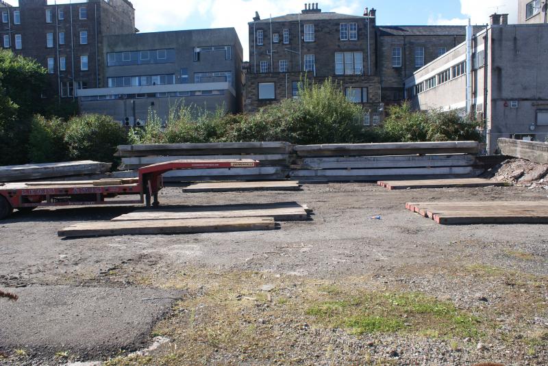 Photo of Removed sections of Shore Road's bridge deck await final break up and recycling.