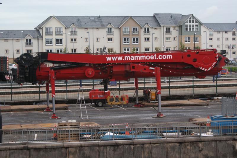 Photo of Thunderbirds are go. The jib of the BIG crane at Stirling set up to for the crane base to reverse onto.