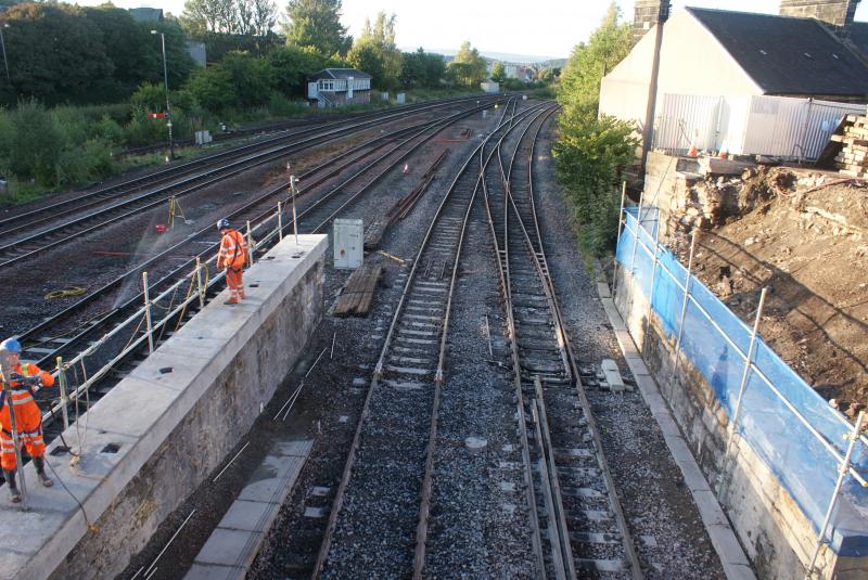 Photo of The concrete drillers in operation to enable the stitching of the new cill at Pier 1 onto the original stonework