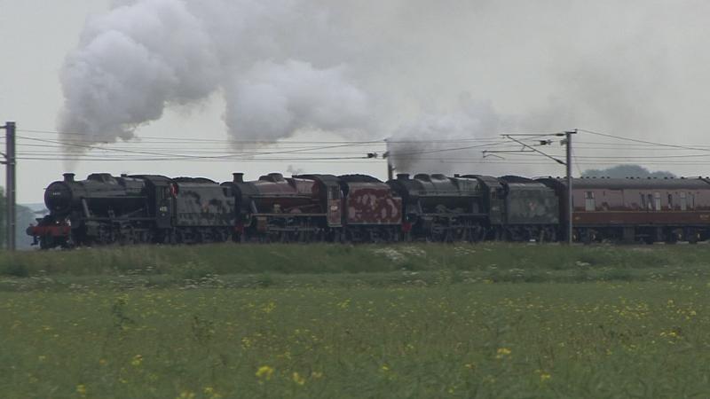 Photo of not 1..   not  2...but  3   steam  locos  + coaches   