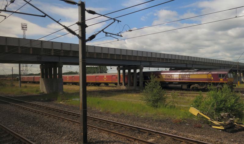 Photo of 66132 sits on top of a 325 at Tyne Yard.