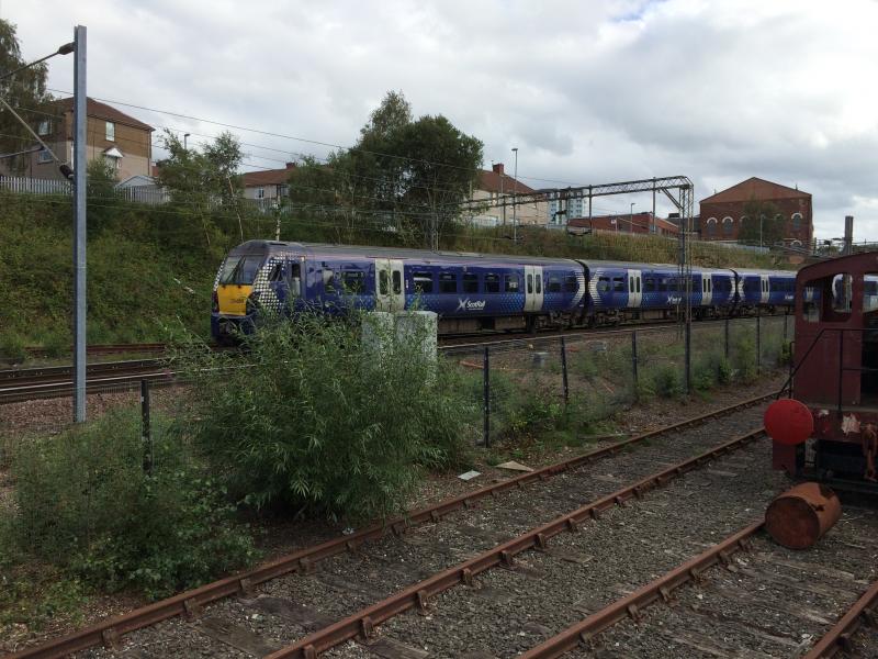 Photo of 334023 & 334009 approaches Coatbridge Sunnyside