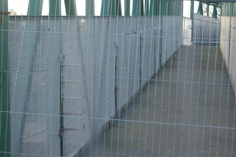 Photo of Kerse Road, Stirling temporary footbridge showing the utility carrier holders