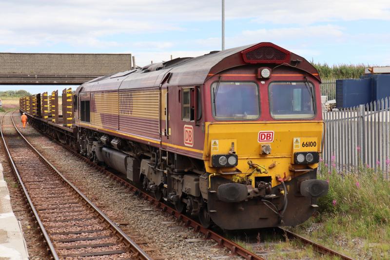 Photo of 66100 At Georgemas with Empty Pipe Wagons