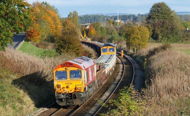 Photo of 66783 'The Flying Dustman' on rear of p-way train at Luncarty. 