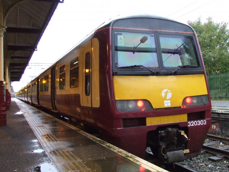 Photo of 320303 on the rear of the 16.57 to High Street in Platform 1 at Milngavie