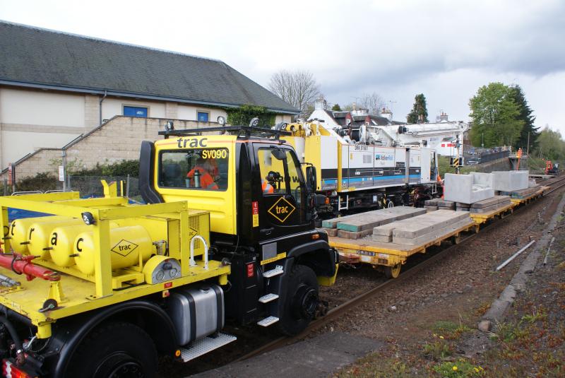 Photo of Trac SV090 Unimog and flat contractors wagons