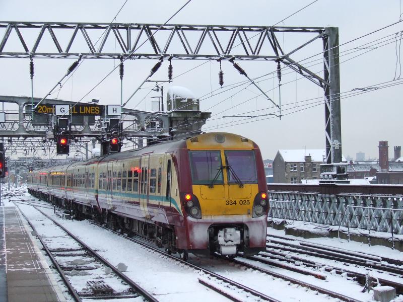 Photo of 334 in the snow at Glasgow Central