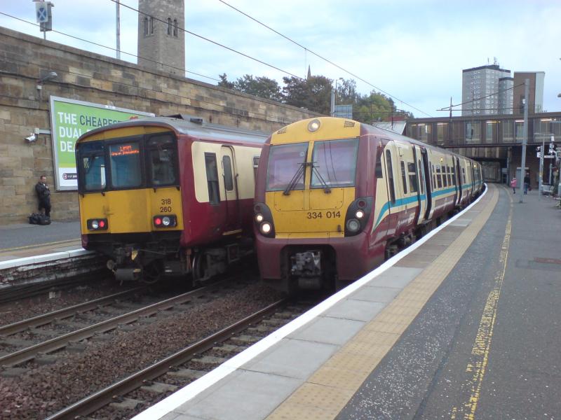 Photo of 334 014 and 318 260 at Motherwell Station