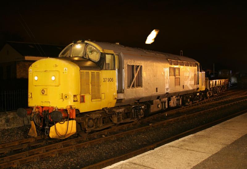 37906 'fires' up:
37906 with a flame coming from the exhuast Photo of 37906 'fires' up